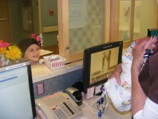 Lydia meeting Emma for the first time. Looking at her baby sister through the open nicu nurses window.