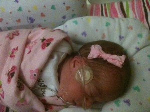 One of Emma's first bows. Thanks, Nurse Tiffany!